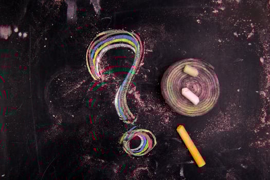 a question mark is drawn on a blackboard photo