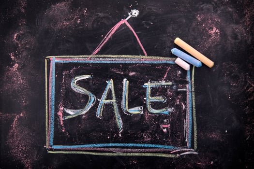 sale chalkboard on blackboard stock photo