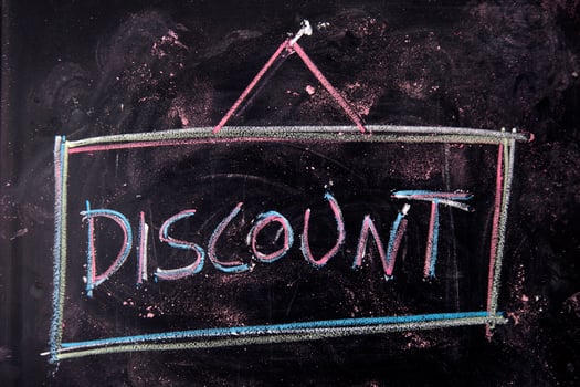Written blackboard with discounts photo