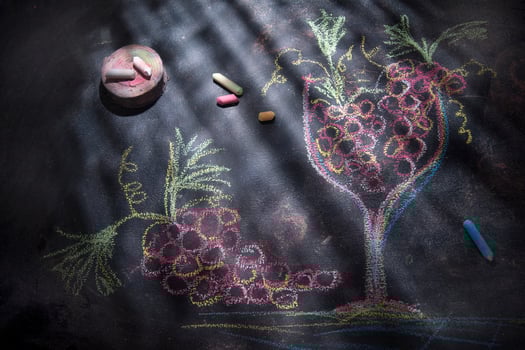 Glass with red grapes photo