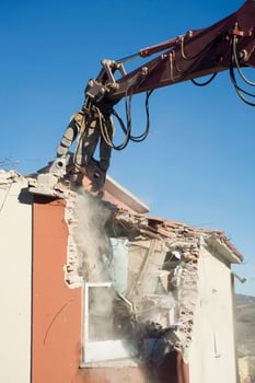 The controlled demolition of a house photo