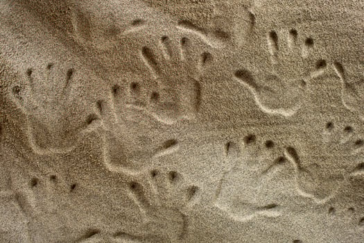Handprints In The Sand photo