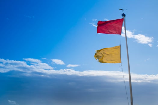 Hazard warning flags at sea photo