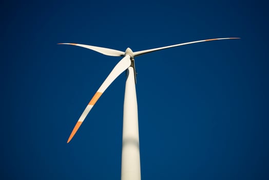 Renewable energy through wind turbines photo