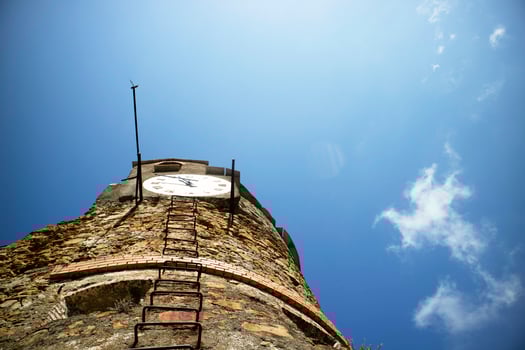 The clock tower in Riomaggiore Cinque Terre photo
