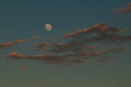 Moon in a sky with clouds,Patagonia Argentina photo