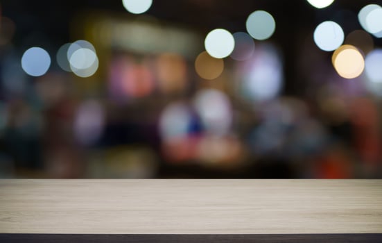 Empty wood table top and blur of out door garden background Empty wooden table space for text marketing promotion. blank wood table copy space for background photo