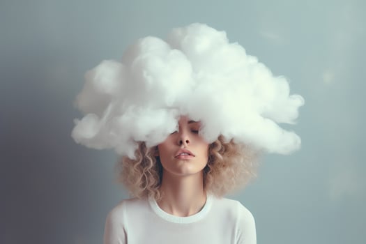 Young woman with her head in cloud. Depression, loneliness and mental health concept. Psychology theme, dreaming, having racing thoughts in mind. Concept of memory loss, dementia. photo