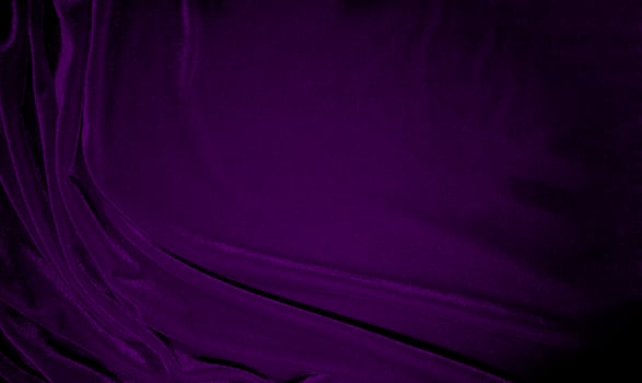 Purple velvet fabric texture used as background. Violet color panne fabric background of soft and smooth textile material. crushed velvet .luxury magenta tone for silk. photo
