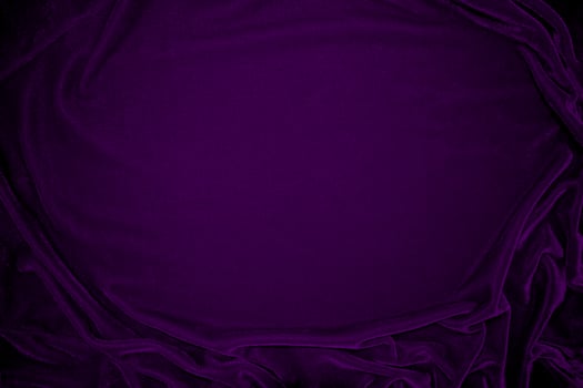 Purple velvet fabric texture used as background. Violet color panne fabric background of soft and smooth textile material. crushed velvet .luxury magenta tone for silk. photo