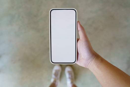 Close up of women's hands holding cell telephone blank copy space screen. smart phone with technology concept photo