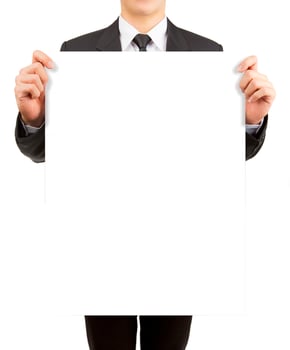 Business man holding blank paper isolated on white background. photo