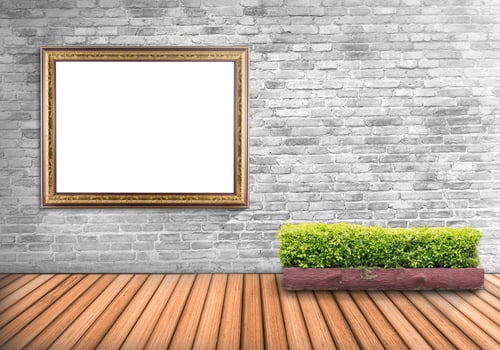 Blank frame vintage on a concrete wall with tree pot on wood floor photo