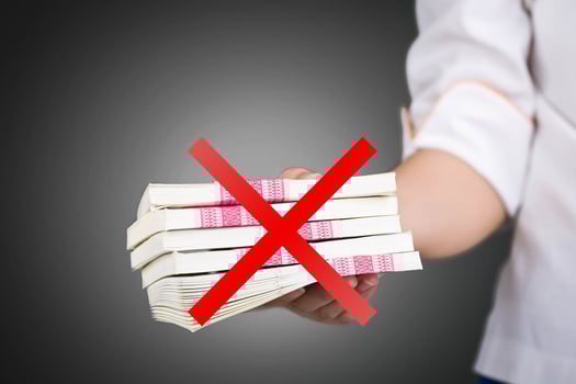 Hand give dirty money pack corruption, not taking. photo