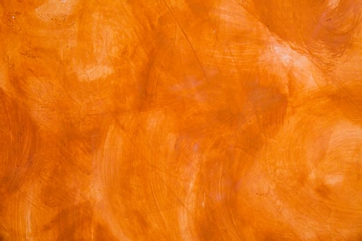 Textured wall brushed painted Background, Abstract Orange Oil Color. photo