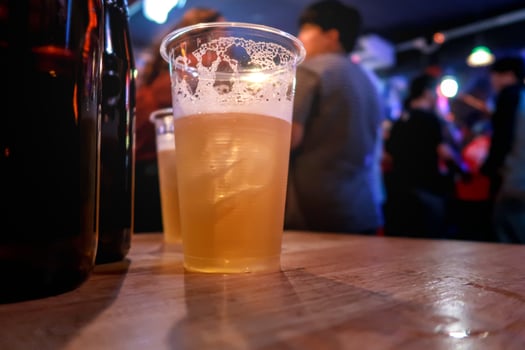 Draft beer.  Enjoying Evening Drinks at the pub party in a nightclub . photo