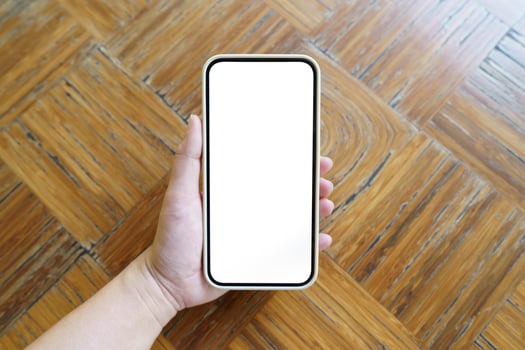 Close up of women's hands holding cell telephone blank copy space screen. smart phone with technology concept photo