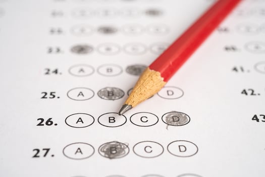Answer sheets with pencil drawing fill to select choice, education concept. photo