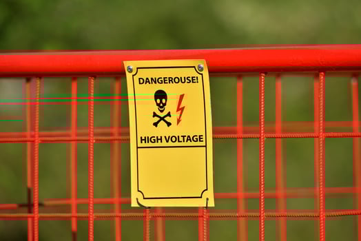 Photography of high voltage sign photo