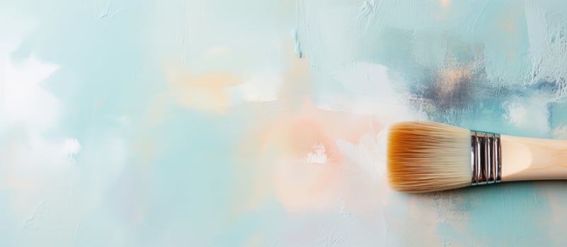 Photo of a paintbrush on a table, ready for artistic creation with copy space