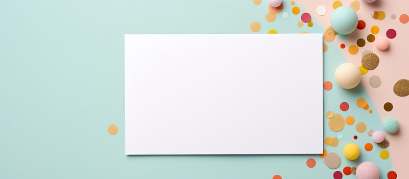 Photo of a blank white sheet of paper surrounded by colorful confetti with copy space