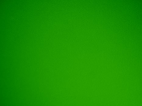 Felt green soft rough textile material background texture close up,poker table,tennis ball,table cloth. Empty green fabric denim background. photo