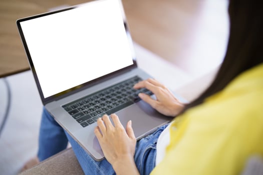 Business woman working from home. work online on laptop. Asian businesswoman working on sofa online business with social distancing laptop online meeting photo