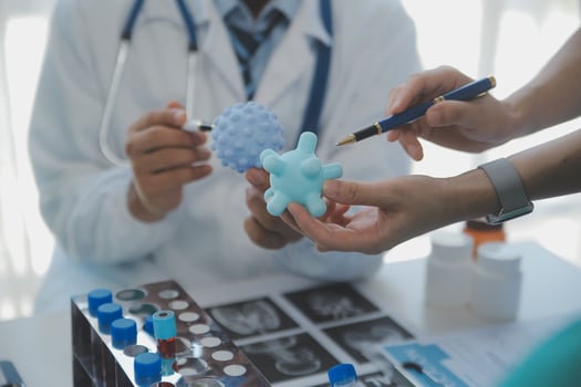 Cropped image of successful medical doctors discussing diagnosis during the conference photo