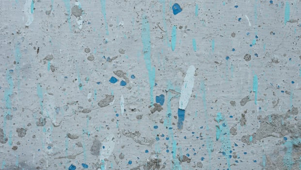 dirty wall texture with streaks of cement and paint photo