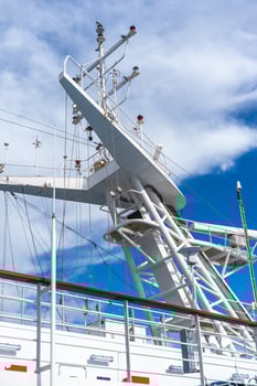 white antennas, radar and other communication and navigation equipment on ship photo