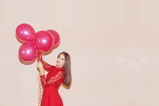 happy and beautiful woman holds air balloons. valentines day, birthday, womens day, anniversary, holiday celebration concept photo
