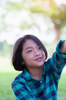 Close up of girls smiling face.Summertime, golden hour, sunset. SSTKHome photo