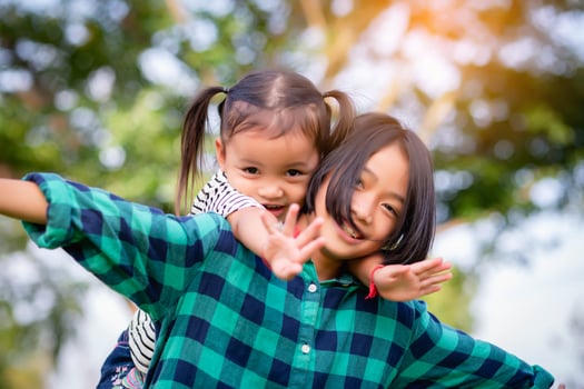 Little girl run through the park.SSTKHome photo