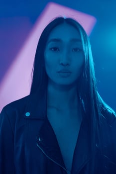 Woman colourful neon light purple trendy caucasian blue concept art portrait photo