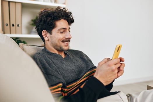 Man home phone lifestyle message typing communication photo