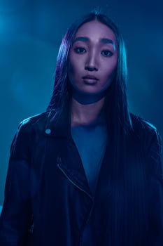 Woman colorful light caucasian concept neon art trendy blue purple portrait colourful fashionable photo
