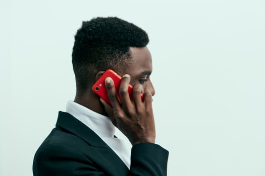 happy man african mobile phone smile black businessman young advertisement technology photo