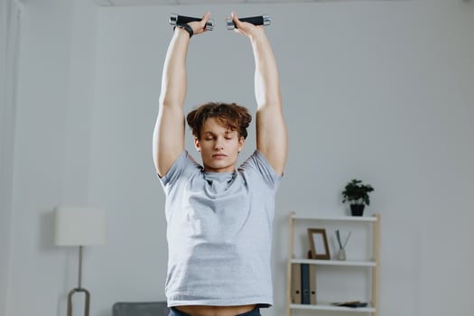 man home exercise indoor training physical gray lifestyle sport dumbbells health activity photo