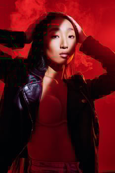 Art woman neon portrait concept colourful bright fashion light young noir red trendy photo