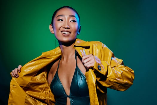 Woman fashion neon elegant colorful light disco green brunette luxury trendy yellow attractive beauty photo