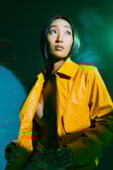 Colourful woman neon art asian light portrait trendy smoke green concept photo