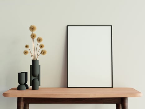 Minimalist living room style with poster photo frame on the wooden table