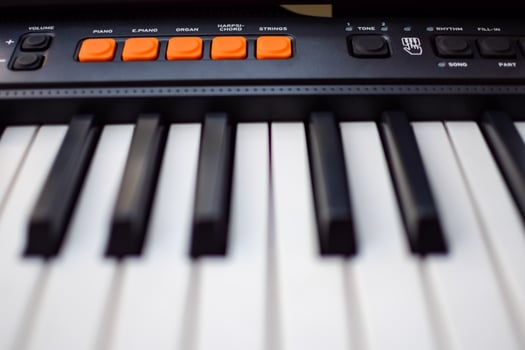Close-up of piano keys. Piano black and white keys and Piano keyboard musical instrument placed at the home balcony during sunny day. photo