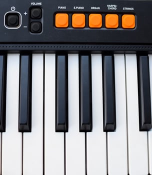 Close-up of piano keys. Piano black and white keys and Piano keyboard musical instrument placed at the home balcony during sunny day. photo