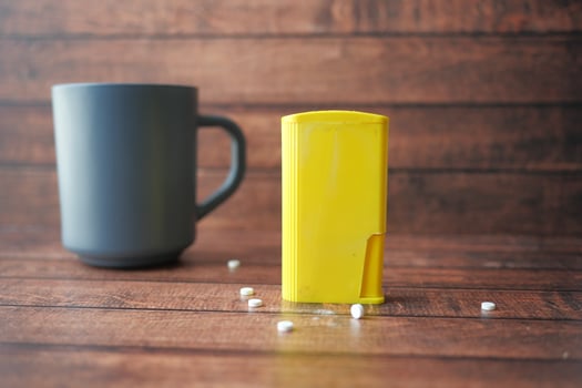 artificial sweetener container on table photo