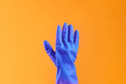 Hands in protective rubber gloves. Migrant votes. Doctors voting. Healthcare system in elections photo