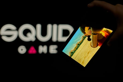 A person watching new Netflix series - Squid Games photo