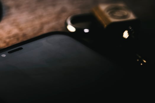 Close-up shot of mobile phone and padlock photo