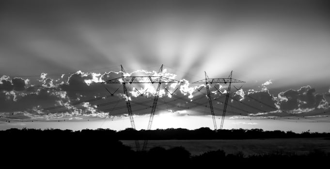 High voltage power line at sunset, Pampas, Argentina photo