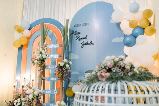 a wedding reception with balloons and flowers photo